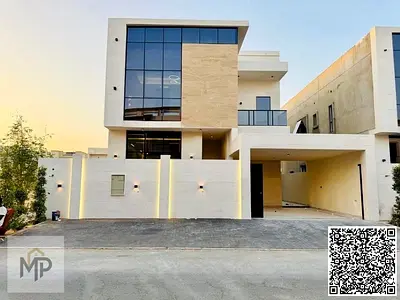 Luxury villa in Al Yasmin, Ajman, ready for immediate occupancy, featuring high-end finishes and spacious living areas. Freehold ownership available t