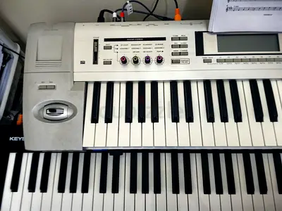 Korg triton Le workstation and Audio 88MK3 Keyboard with Various Features