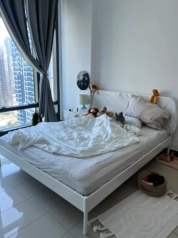 Stylish White Bed with Cozy Bedding