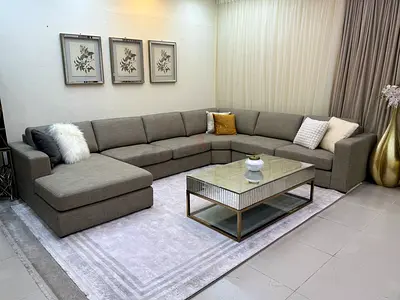 Caramel brown ushape sofa home centre eterno