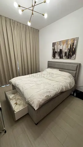 Stylish Grey Bed with Storage