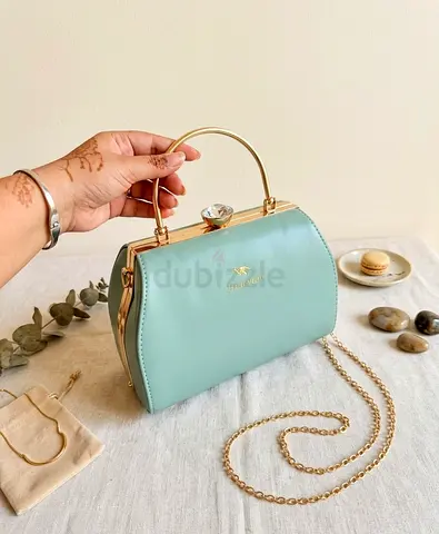Huaxiao Teal Handbag