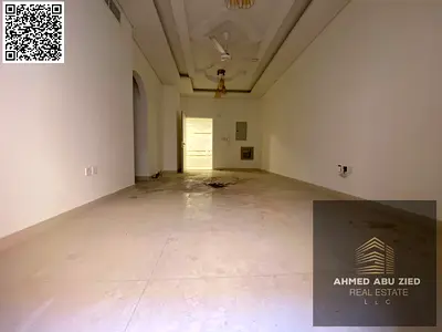 New Building – First Tenant – Al Mowaihat 3 Spacious two-bedroom apartment with living room for annual rent, featuring a balcony with view, built-in w