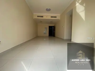 The most elegant 2BR hall apartment in Al Jurf, modern design, spacious layout, balcony, built-in wardrobes, prime location near all services and main