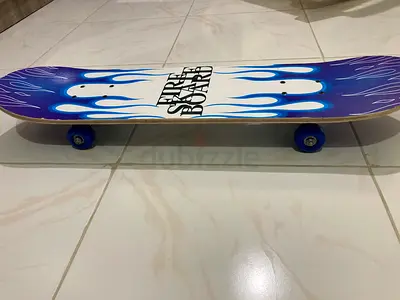 Blue flame skateboard — used, good condition