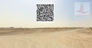 A plot of land in Masfout 9 is for sale, with an area of ​​more than 5000 square feet. It has a 