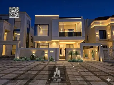 Villa for sale, modern finishing, directly on Sheikh Mohammed Bin Zayed Road and next to the mosque. Prime location. Ground floor, first floor and roo