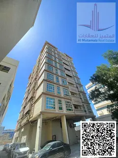 Two-bedroom apartment with a living room, two bathrooms, a kitchen, and a balcony in the Al-Hamidiya
