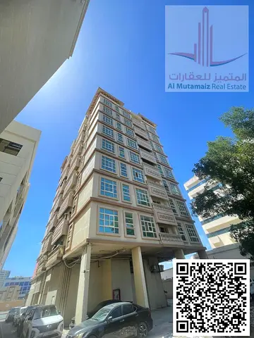 Two-bedroom apartment with a living room, two bathrooms, a kitchen, and a balcony in the Al-Hamidiyah area.