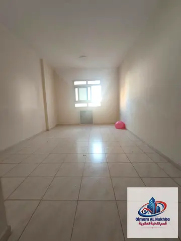 Two-bedroom apartment with a living room in Al Qasimia, Al Nud - with a balcony and view - suitable for employees - two bathrooms - very spacious