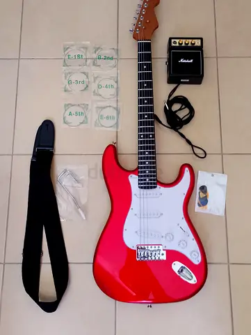 Urgent sale, willing to negotiate: Beginner electric set with mini amp.