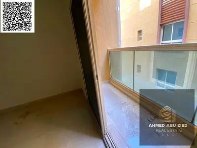 bedroom apartment with a hall, first tenant in Emirates City on Sheikh Mohammed Bin Zayed Road, master room, 2 bathrooms, balcony, central AC, free gy