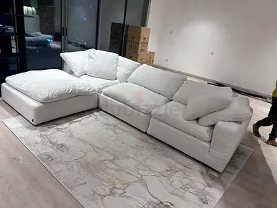 Model luscious feather filled sofa with footstool