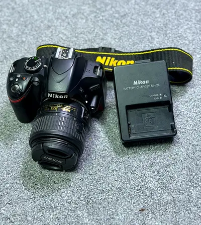 Nikon D3200 with 18-55mm lens  Dslr camera
