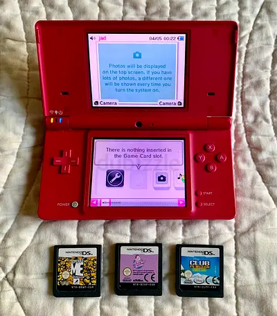 Nintendo DSi in Pink Color with 3 Games.