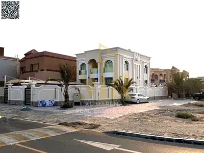 A villa with all electricity, water and air conditioning fees included, on the main street, ready to move in, in the most prestigious areas of Ajman.
