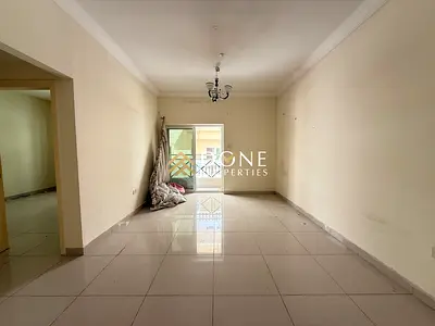 Cozy 1BHK with Master Bedroom, Built-in Wardrobe, Balcony, and Covered Parking