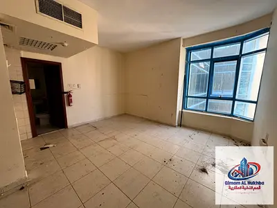 Sharjah – Spacious studio for rent in Al Qasimia, ideal for individuals, bright and comfortable living space, rent 25,000 AED in 4 installments