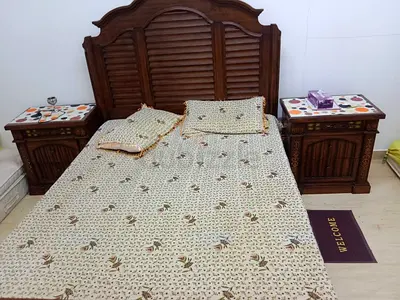 Elegant Brown Wooden Bed Set with Side Tables
