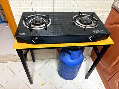 2-burner glass-top gas stove with adnoc cylinder, pipe  regulator