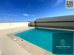 Luxury 2BR in Emirates City with gym &amp; pool. Master rooms, wardrobes, balcony, open kitchen, cen