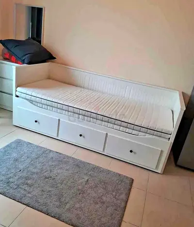 IKEA Hamnes Day bed with 3 storage drawers underneath and with 2 IKEA mattresses