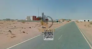A prime industrial plot available in Umm Al Thu'ub Industrial Area, offering a strategic locatio