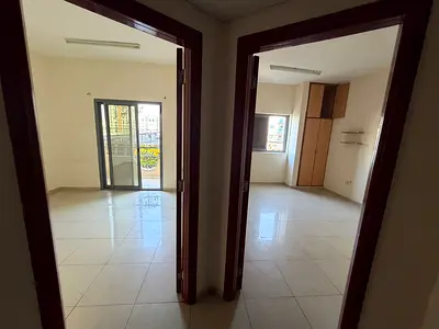Near Gulfa Bridge! 1BR Apartment with Separate Living Room & Balcony – AED 26,000