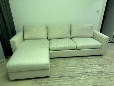 IKEA beige color sofa bed with storage