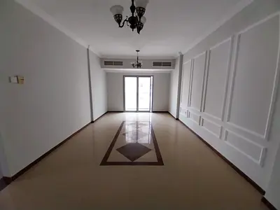 Two-bedroom apartment with a living room in Al Nuaimiya, near Gulf Bridge, minutes from Safeer Mall. Two bathrooms, balcony, central air conditioning,