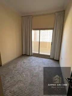 One bedroom and living room, first occupancy, for annual rent in Emirates City on Sheikh Mohammed Bi