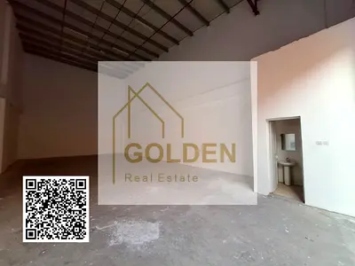 مستودع 1500 قدم مربع مع كهرباء 20 كيلوواط على شارع رئيسي بالجرف الصناعية 1، جاهز للاستلام.