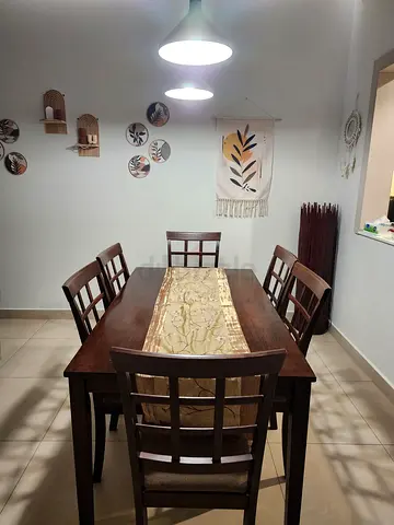 6-seater solid wood dining table with 6 chairs