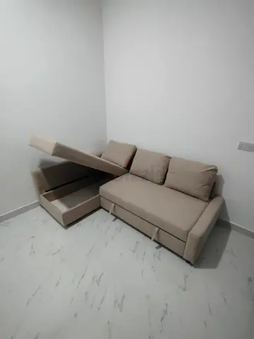 IKEA L Shape Sofa cum bed with big storage and you can fix the storage left or right any side