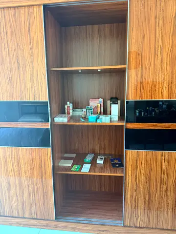 Stylish Wooden Cabinet with Glossy Finish. This is an oriental cabinet wardrobe , well maintained