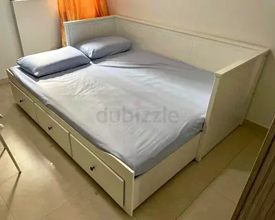 IKEA Hamnes Day bed with 3 storage drawers underneath and with 2 IKEA mattresses