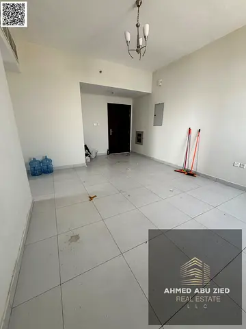 2BR in Al Jurf 3: 2 bed- one of which is a master bedroom, 2 baths, spacious hall, central AC, prime location near all services.