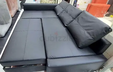 Black faux-leather convertible sofabed sectional (pull-out)