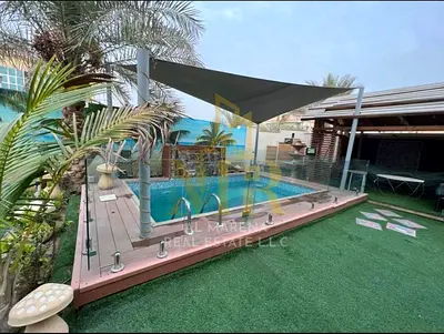 Corner Villa with Swimming Pool for Sale in Al Rawda 3