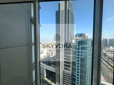 High Floor 2BR with Sea View | Prime SZR Location | Vacant