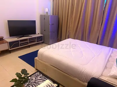 Private room with attached balcony and bathroom for rent in Dubai sports city