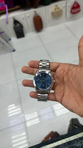 Mens stainless steel wristwatch with blue dial - used