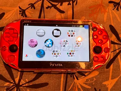 Psvita 2000 red 128 gb of games +case protection +cable