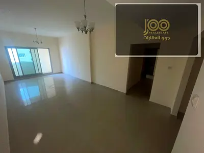2-bedroom apartment with living room in Al Rashidiya 3 next to Grand Mall, 3 bathrooms, balcony, free AC, spacious, AED 48,000 in 4 installments.