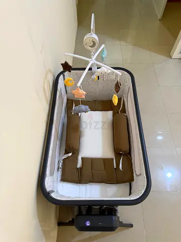 My baby bassinet with mobile and mattress - good condition