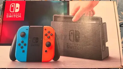 Nintendo Switch with Neon Blue and Red Controllers UAE version