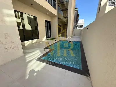 Luxury villas in Al Yasmin with a swimming pool and rooftop, high-end finishing, for sale. Two luxury villas in the Al Yasmin area, with a modern desi