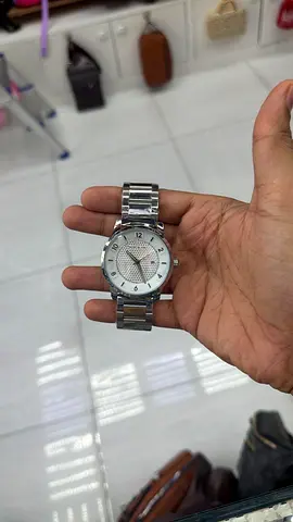 My silver stainless steel men’s wristwatch - working