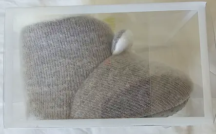 Infant booties in a box