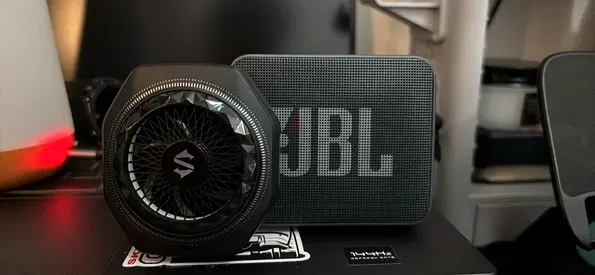 JBL compact portable Bluetooth speaker (JBL Go) + BlackShark phone cooler — used